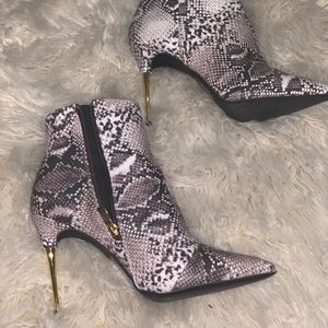 Brown snakeskin & gold booties.